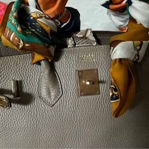 Preowned vintage Hermes Birkin bag selling as it in fair condition as it gray